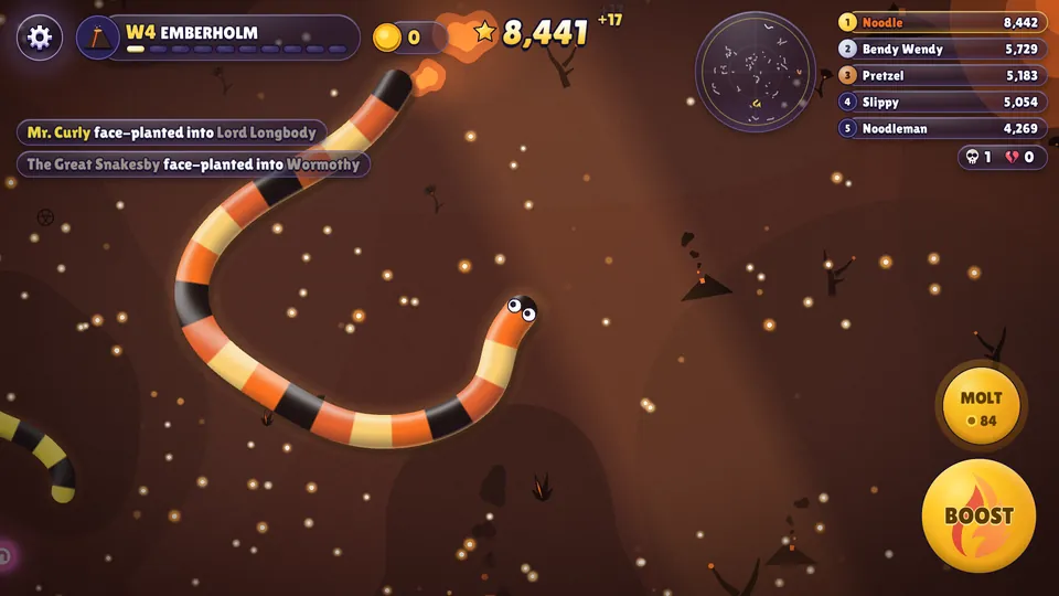 Gameplay in Emberholm: an orange, black and cream banded snake arcs across dark volcanic ground scattered with glowing embers, at the top of the leaderboard.