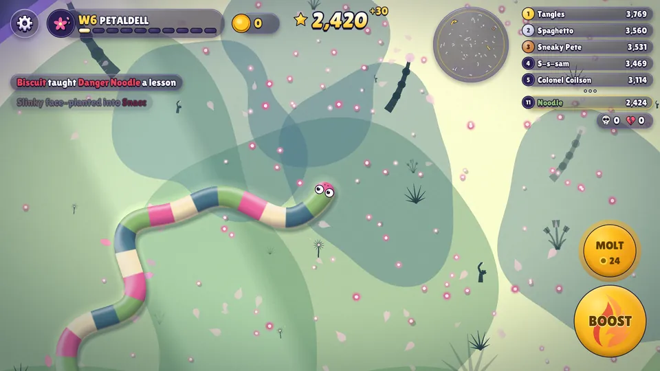 Gameplay in Petaldell: a long pink, green and cream snake winds across a pale green meadow while petals fall.